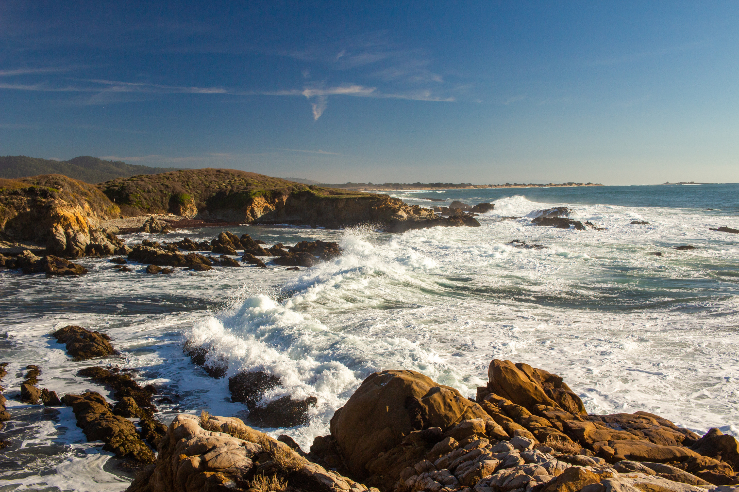 Pacific Ocean waves crash on the rocks near Pescadero, California