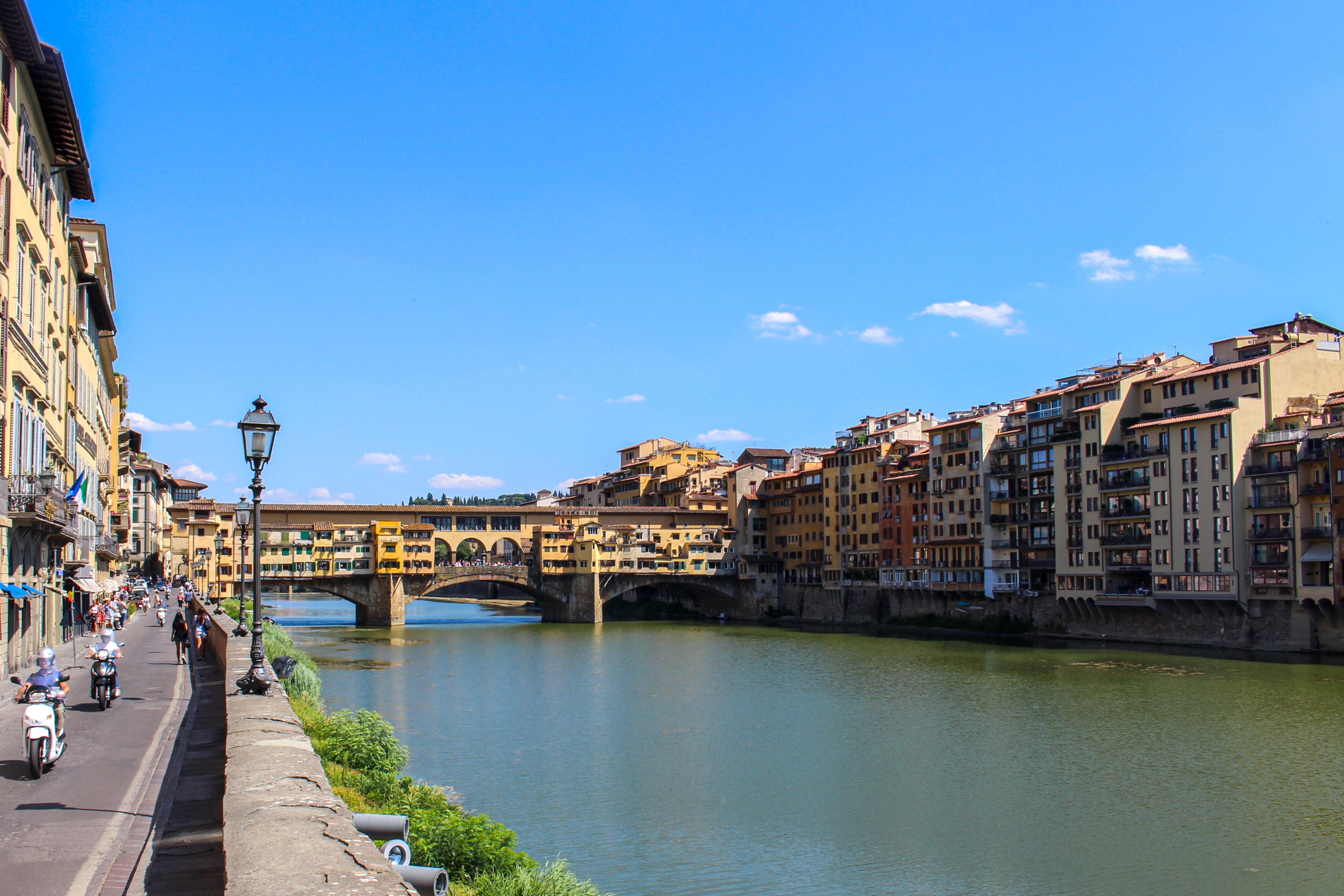 a view of the ponte vecchio in florence italy along the arno river