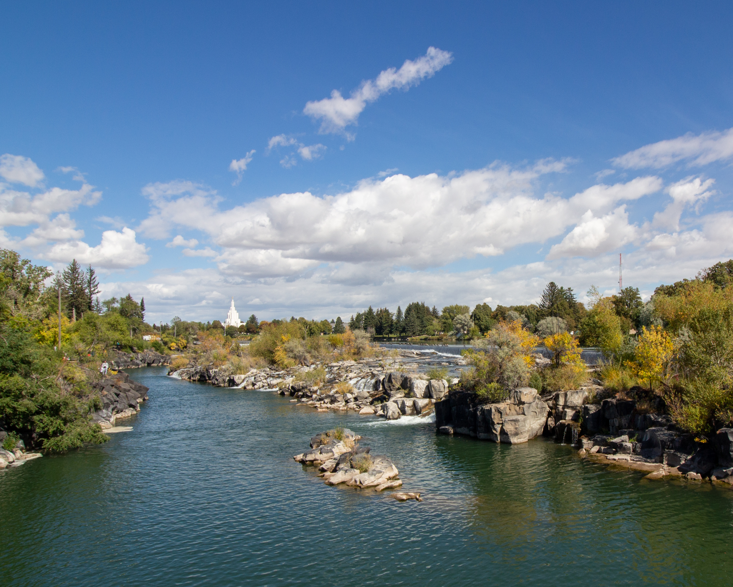 the idaho falls temple in the distance from the greenbelt trail along the Snake River