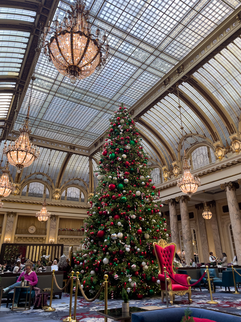 San Francisco Palace Hotel Atrium under the glass ceiling with Christmas Decorations and Christmas Tree
