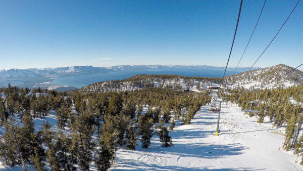 view of lake tahoe from a ski lift at heavenly in winter