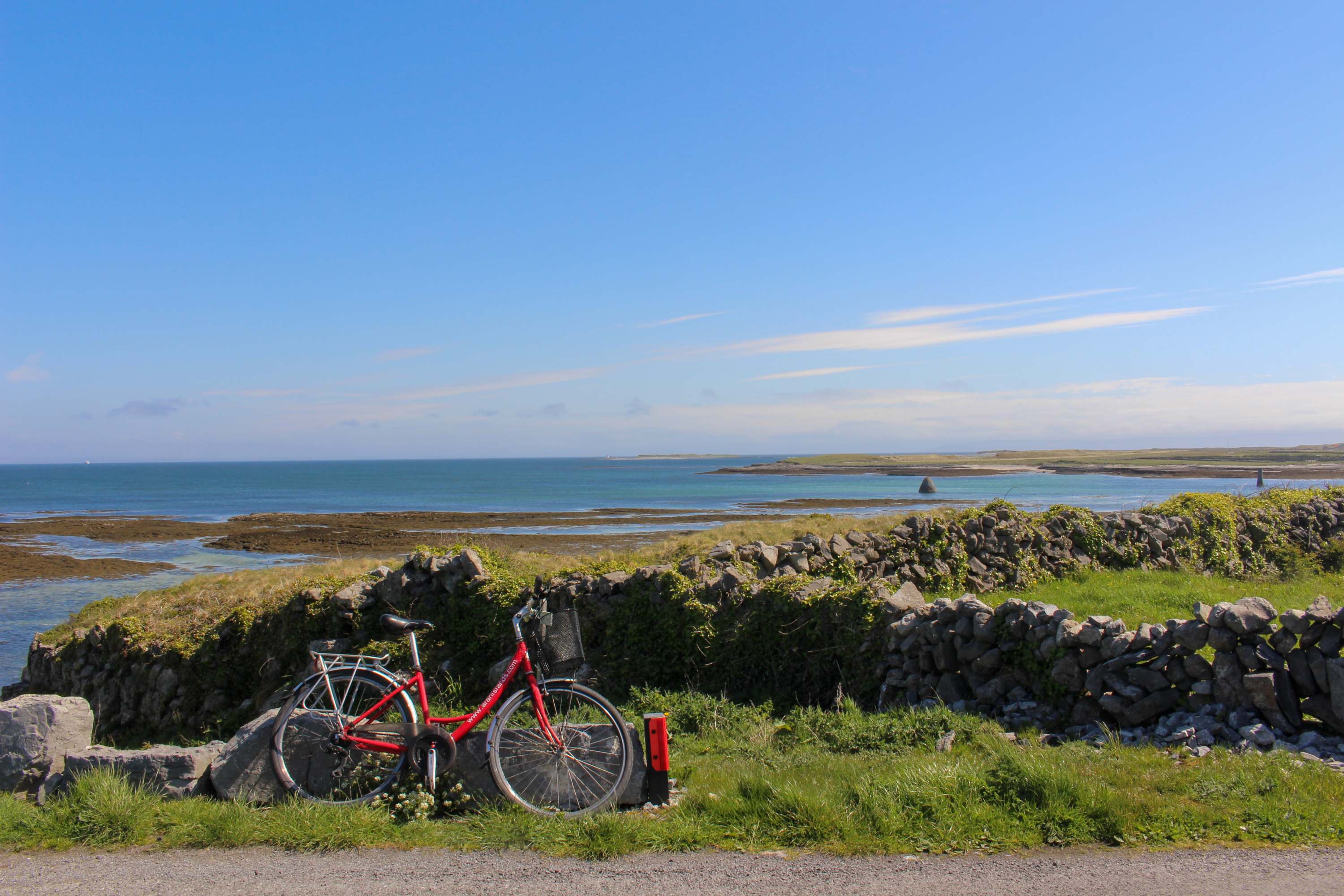 red bike in inshmore on the aran islands in ireland