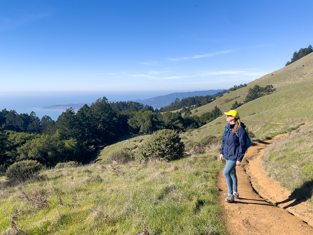 hiker on Matt Davis Trail at Mount Tamalpais hike with Pacific Ocean views