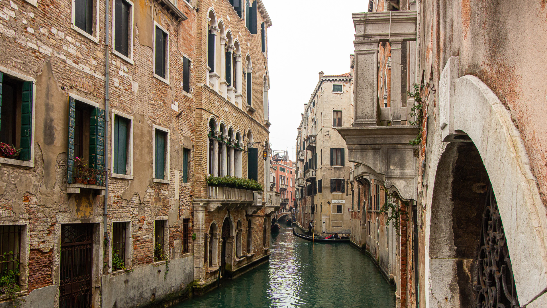 view of buildings along a canal in venice, Italy, solo female travel