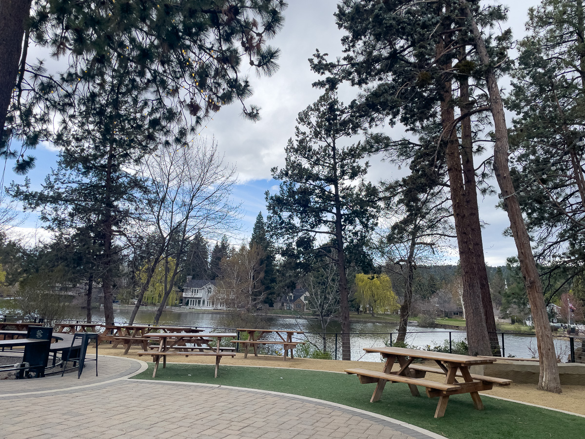 Bend Brewing Outdoor Seating, mirror pond along the deschutes river from Bend Brewing, dog friendly things to do in Bend Oregon